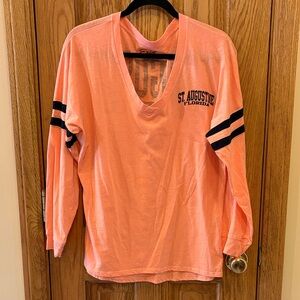 Exist Vibrant Orange and Black Apparel - St. Augustine Florida